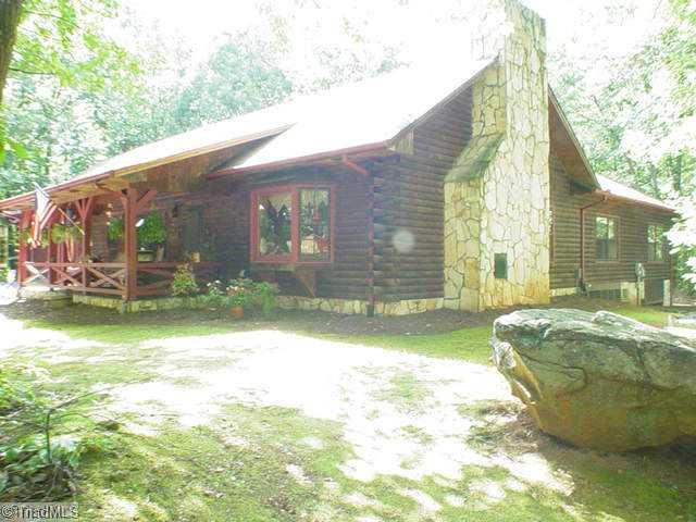 Exterior Front. Welcome to 1500 Oscar Frye Road. Custom log home in a perfect country setting.