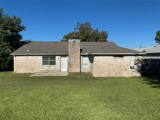 a view of a house with a garden