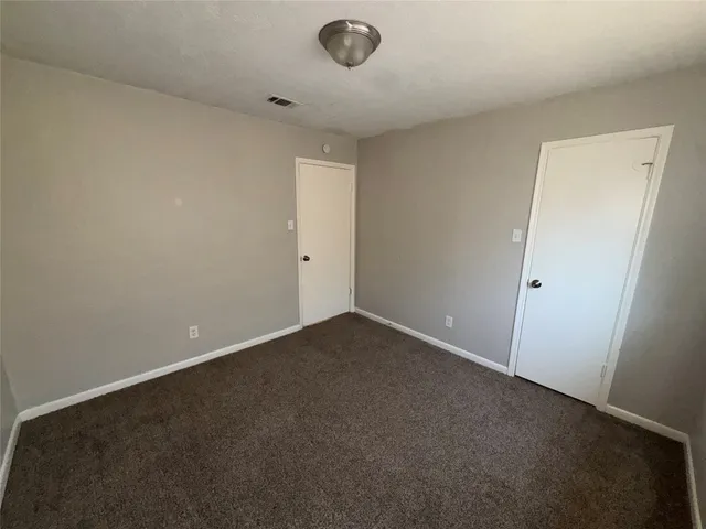 an empty room with a workbench