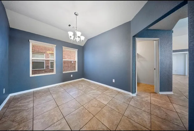 a view of an empty room with window