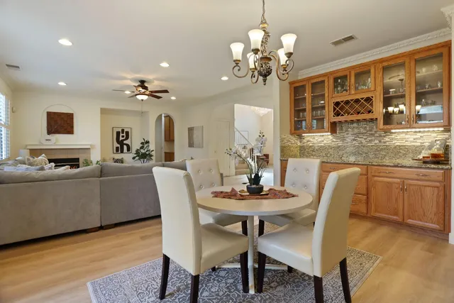 a kitchen with a stove a sink and a microwave