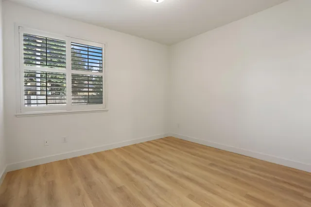 a view of living room with furniture and rug