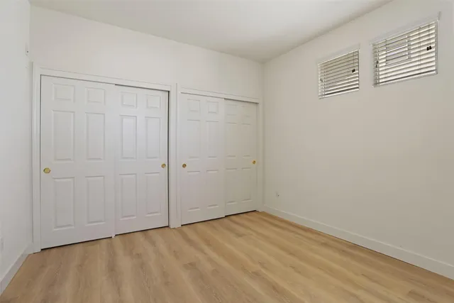 a bathroom with a shower and a toilet