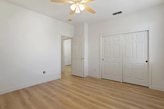 a view of entryway with wooden floor