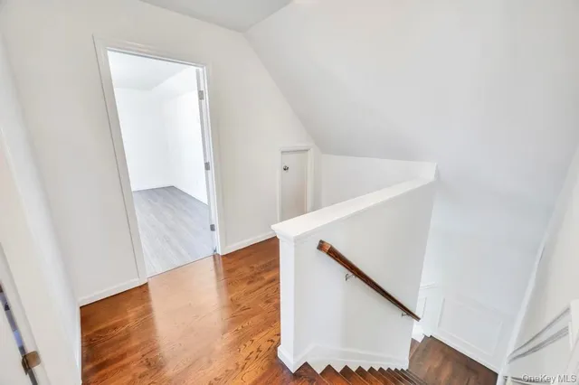 a view of a hallway view with staircase