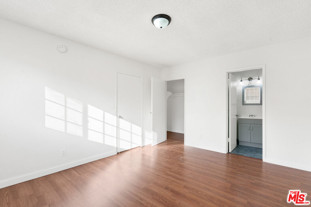 12325 Oxnard Street, Unit 6 North Hollywood, CA 91606 - Photo 9 of 11 a view of a room with wooden floor