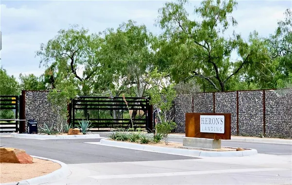a front view of a house with parking space