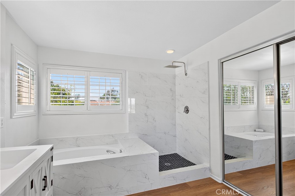 31928 Cercle Chambertin Temecula, CA 92591 - Photo 39 of 74 a bathroom with a bathtub and a shower