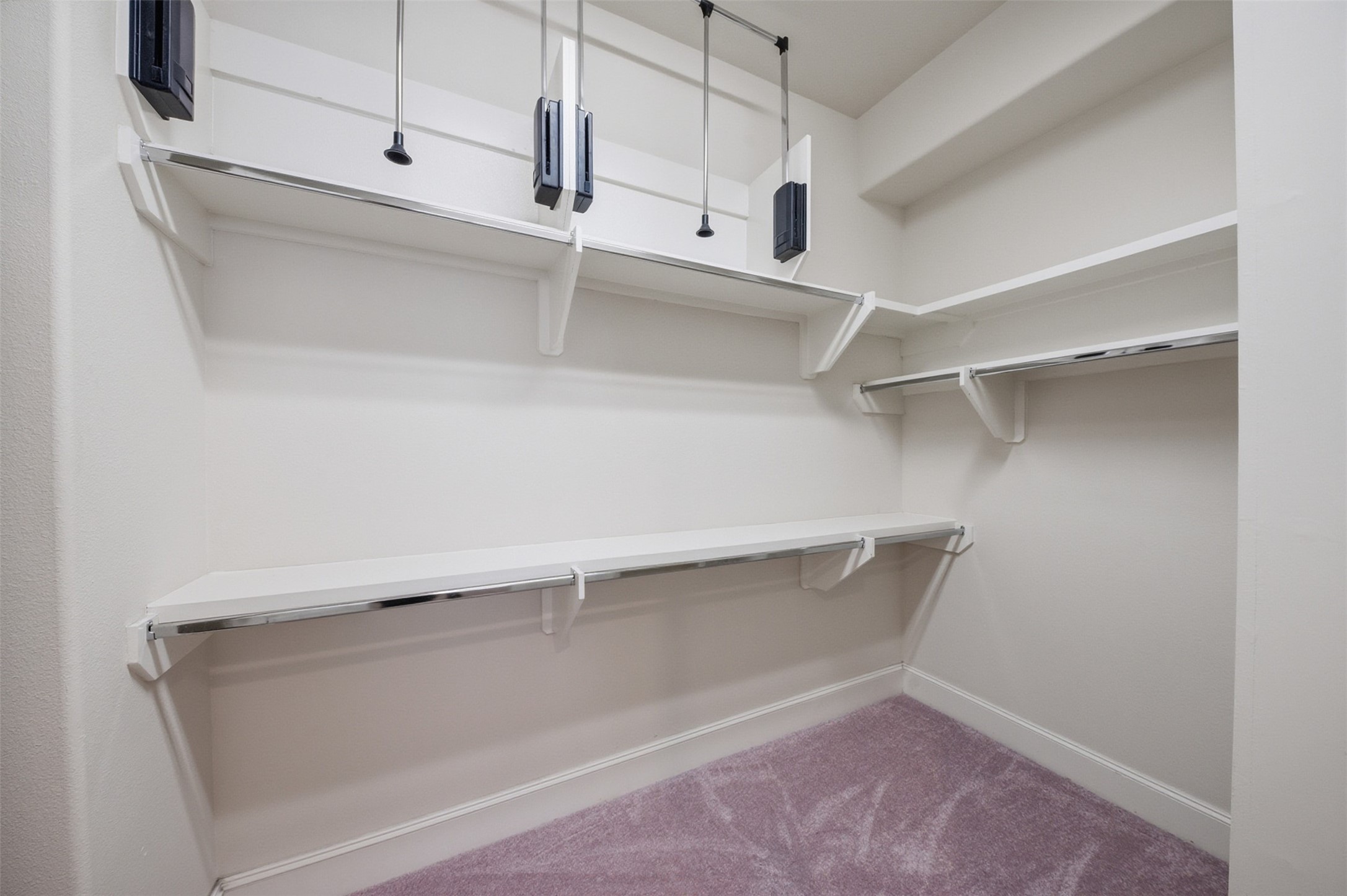 5606 Cohn Terrace Houston, TX 77007 - Photo 25 of 39 a view of an empty walk in closet