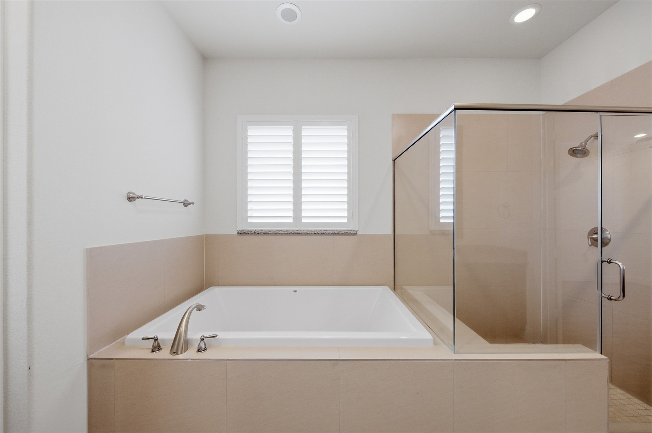 5606 Cohn Terrace Houston, TX 77007 - Photo 26 of 39 a bathroom with a bathtub and a shower