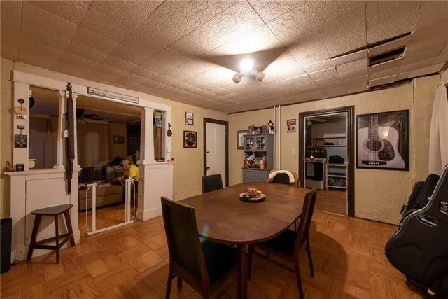 a view of a dining room with furniture