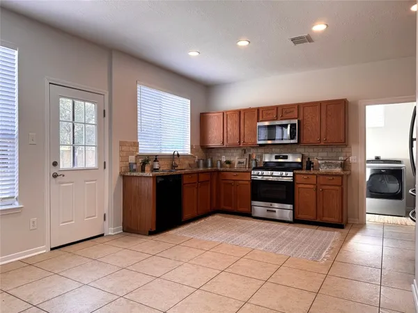 $2,095 | 23906 Kingmont Knoll Court, Spring, TX 77373