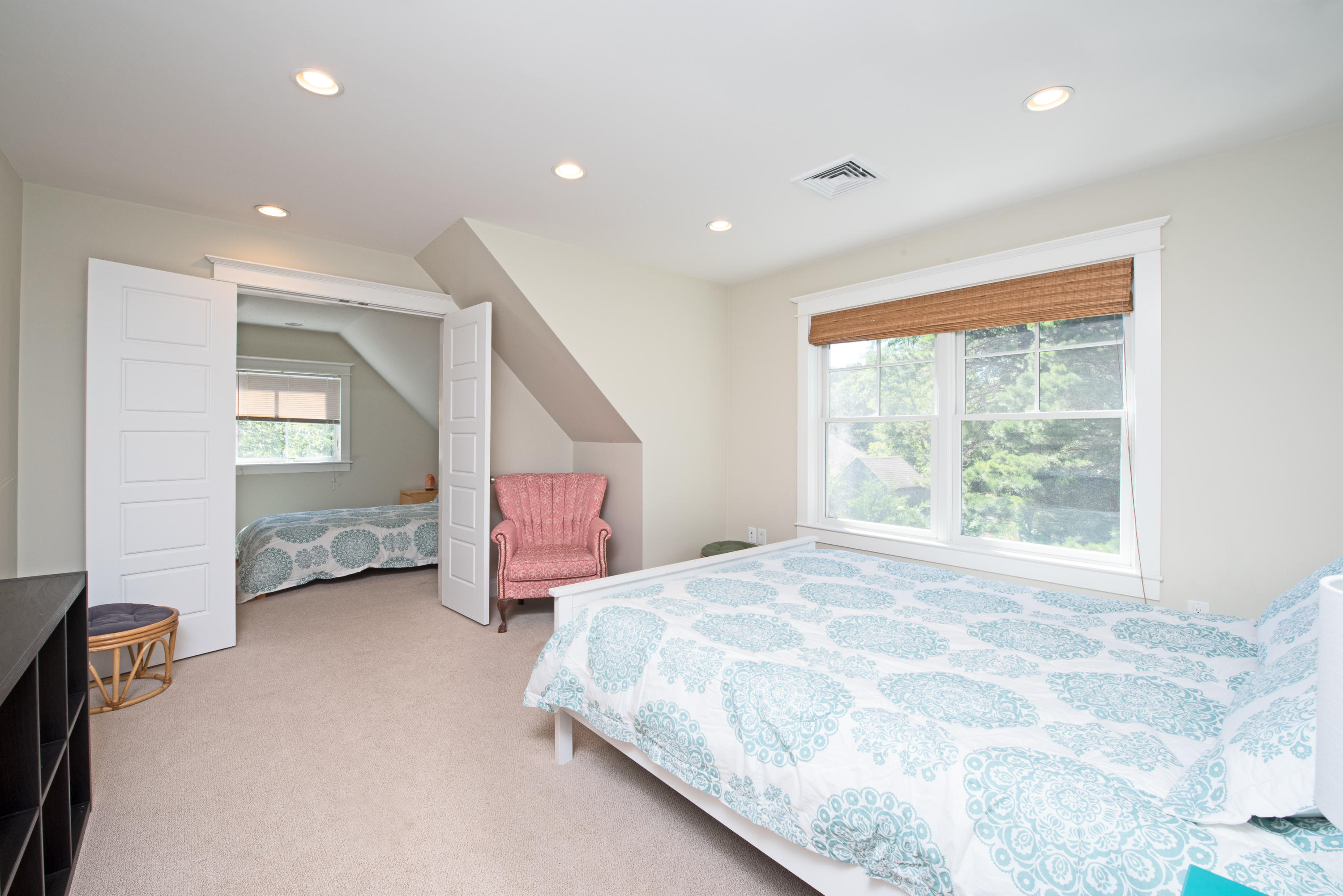 100 Peace Valley Road Wellfleet, MA 02667 - Photo 29 of 33 a spacious bedroom with a bed and a dresser