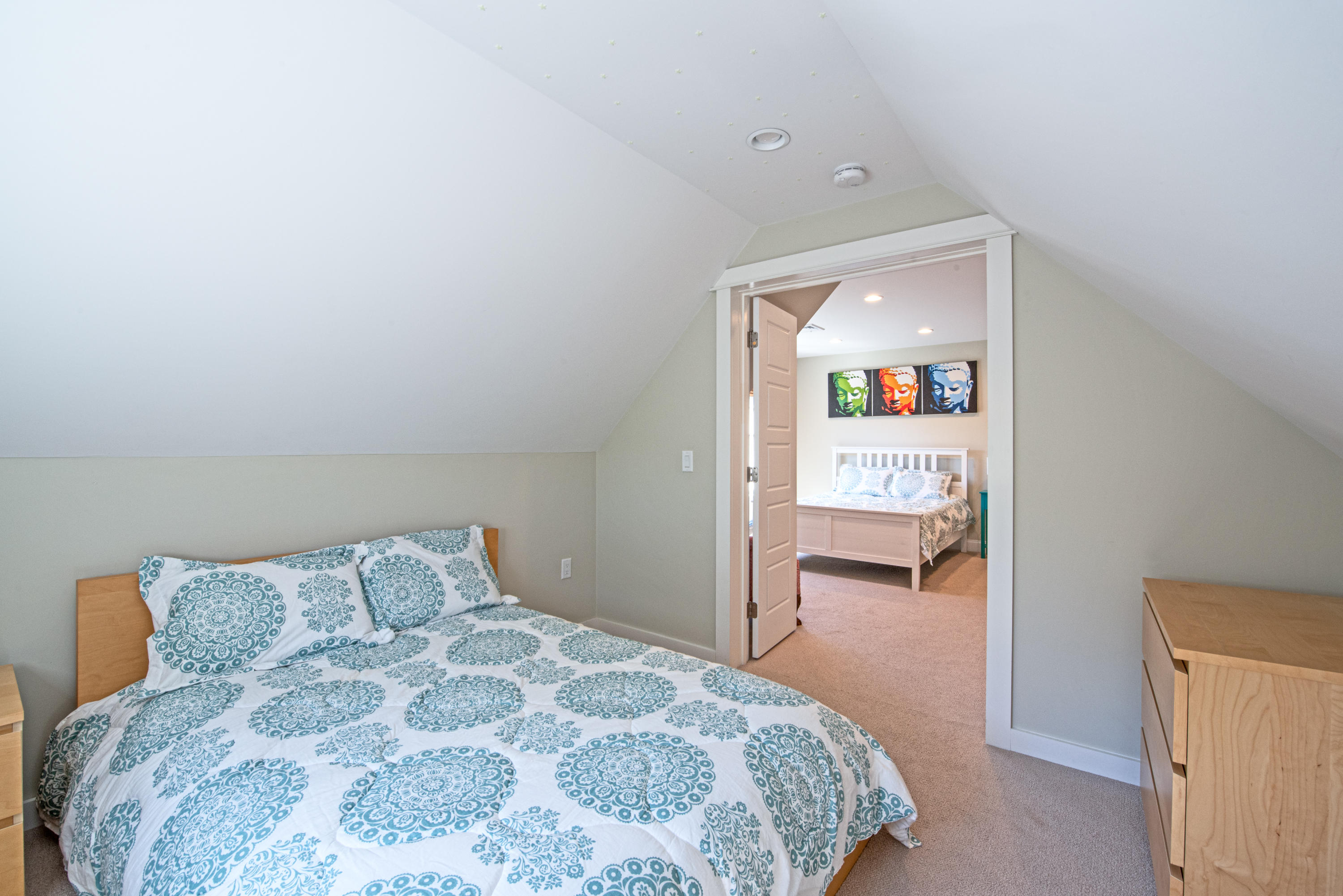 100 Peace Valley Road Wellfleet, MA 02667 - Photo 30 of 33 a bedroom with a bed and a view of kitchen