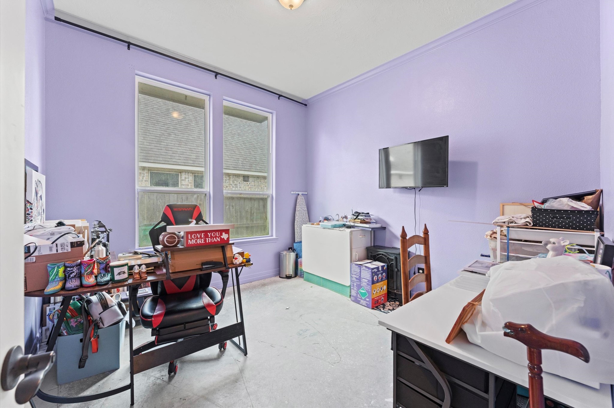 3510 Whitman Drive Rosharon, TX 77583 - Photo 15 of 25 This room features lavender walls and large windows that provide natural light.