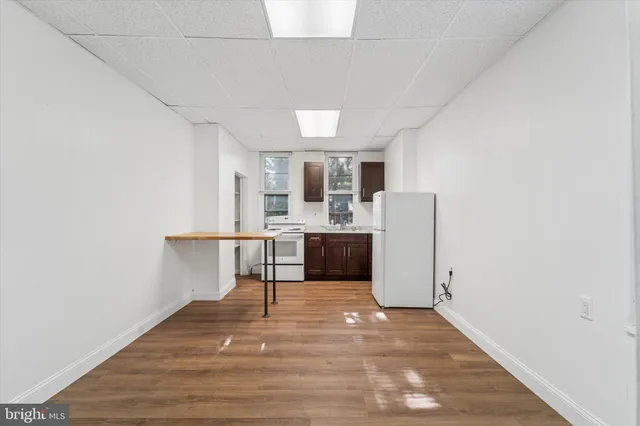 a view of kitchen with a sink
