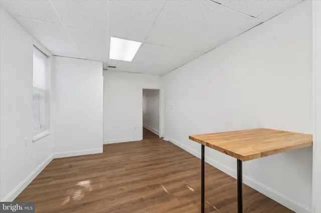 a view of an empty room and window