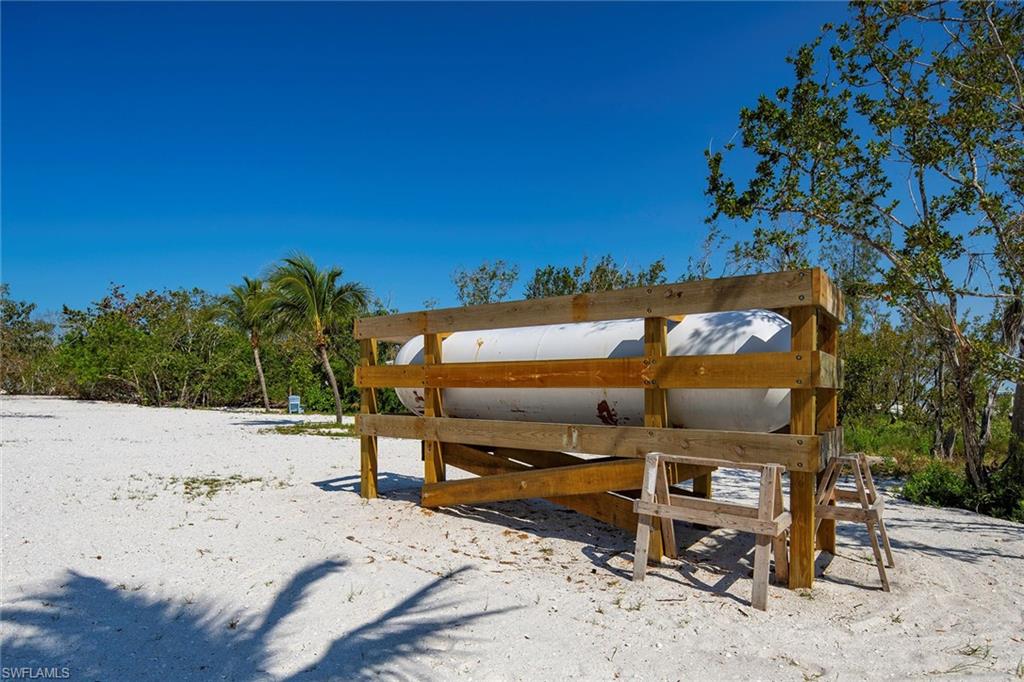 11687 Keewaydin Naples, FL 34113 - Photo 35 of 49 a view of a backyard