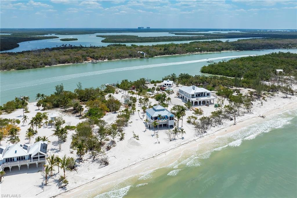 11687 Keewaydin Naples, FL 34113 - Photo 46 of 49 a view of a lake with a city