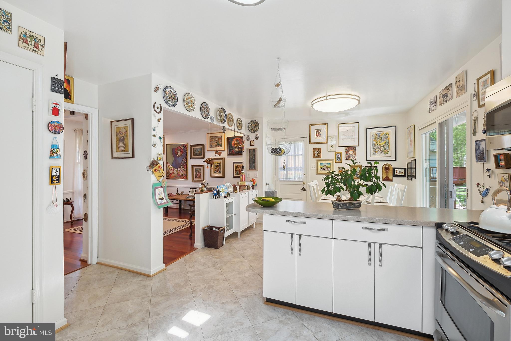 12012 Coldstream Drive Potomac, MD 20854 - Photo 12 of 42 a kitchen with cabinets and window