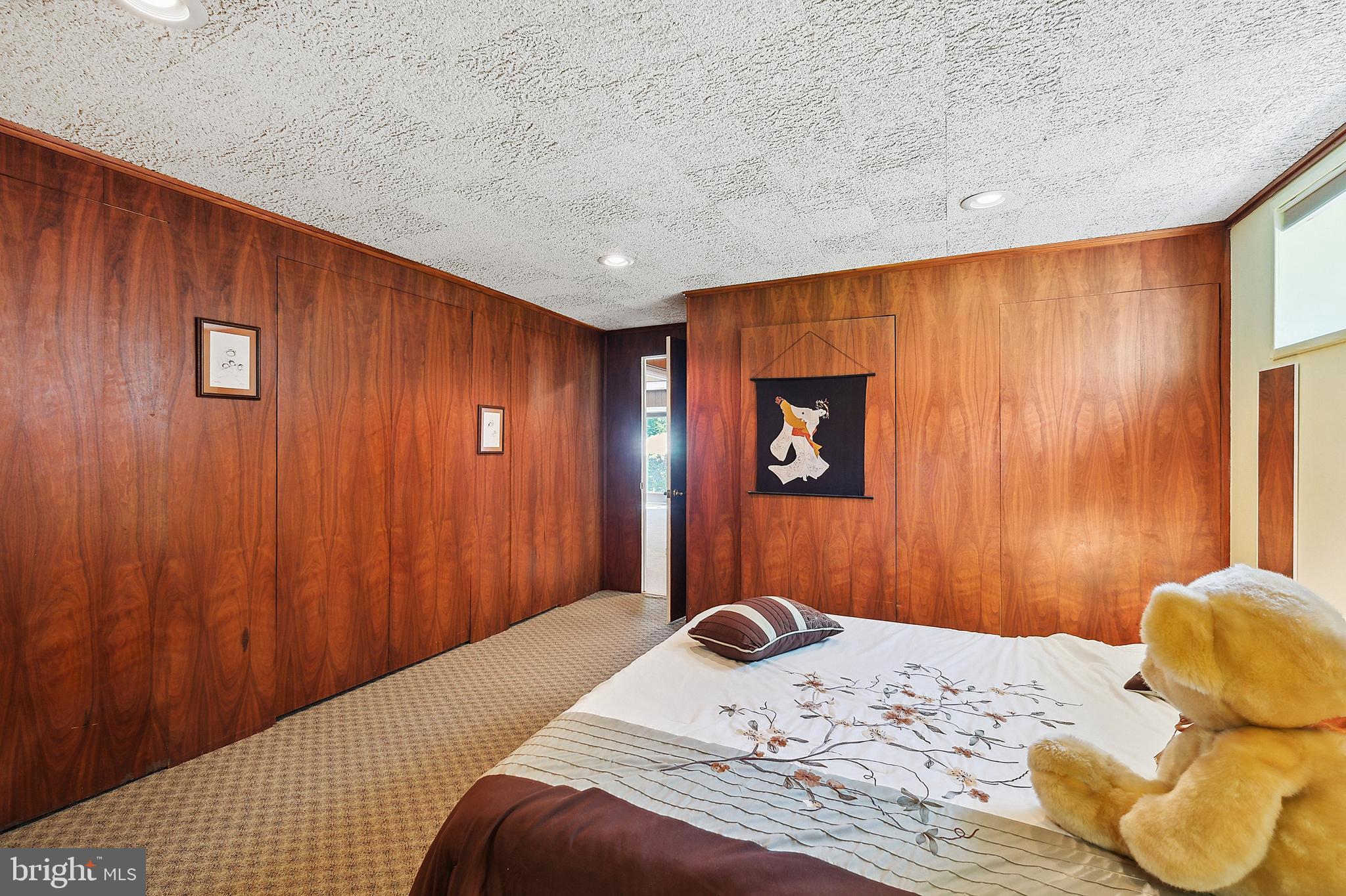 12012 Coldstream Drive Potomac, MD 20854 - Photo 26 of 42 a bedroom with a bed and a window