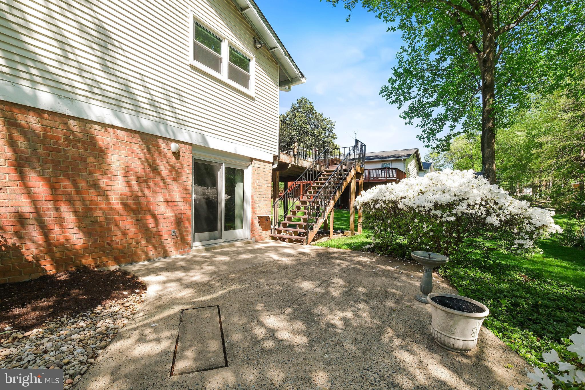 12012 Coldstream Drive Potomac, MD 20854 - Photo 31 of 42 a view of a small house with a patio