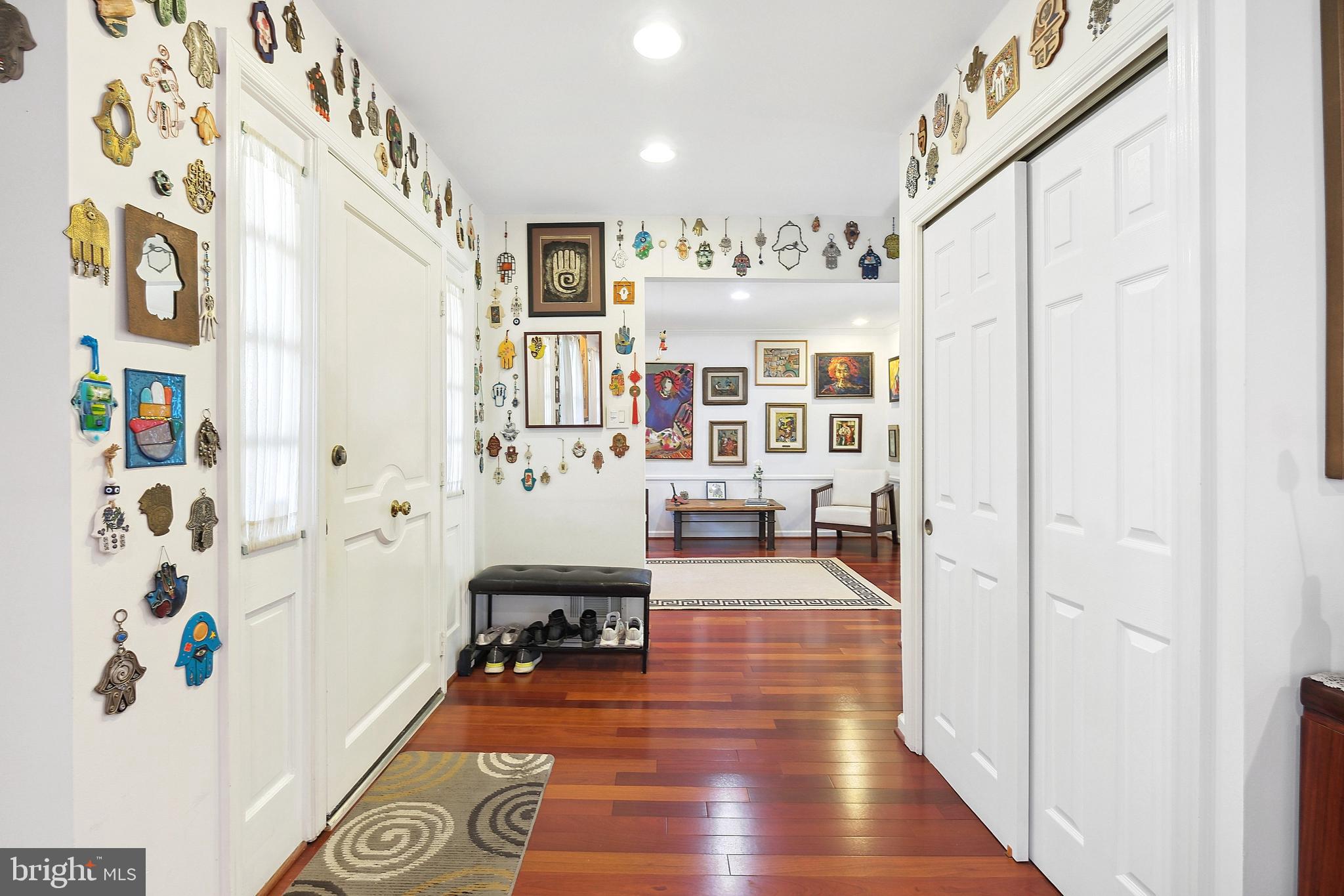 12012 Coldstream Drive Potomac, MD 20854 - Photo 4 of 42 a living room with furniture and wooden floor