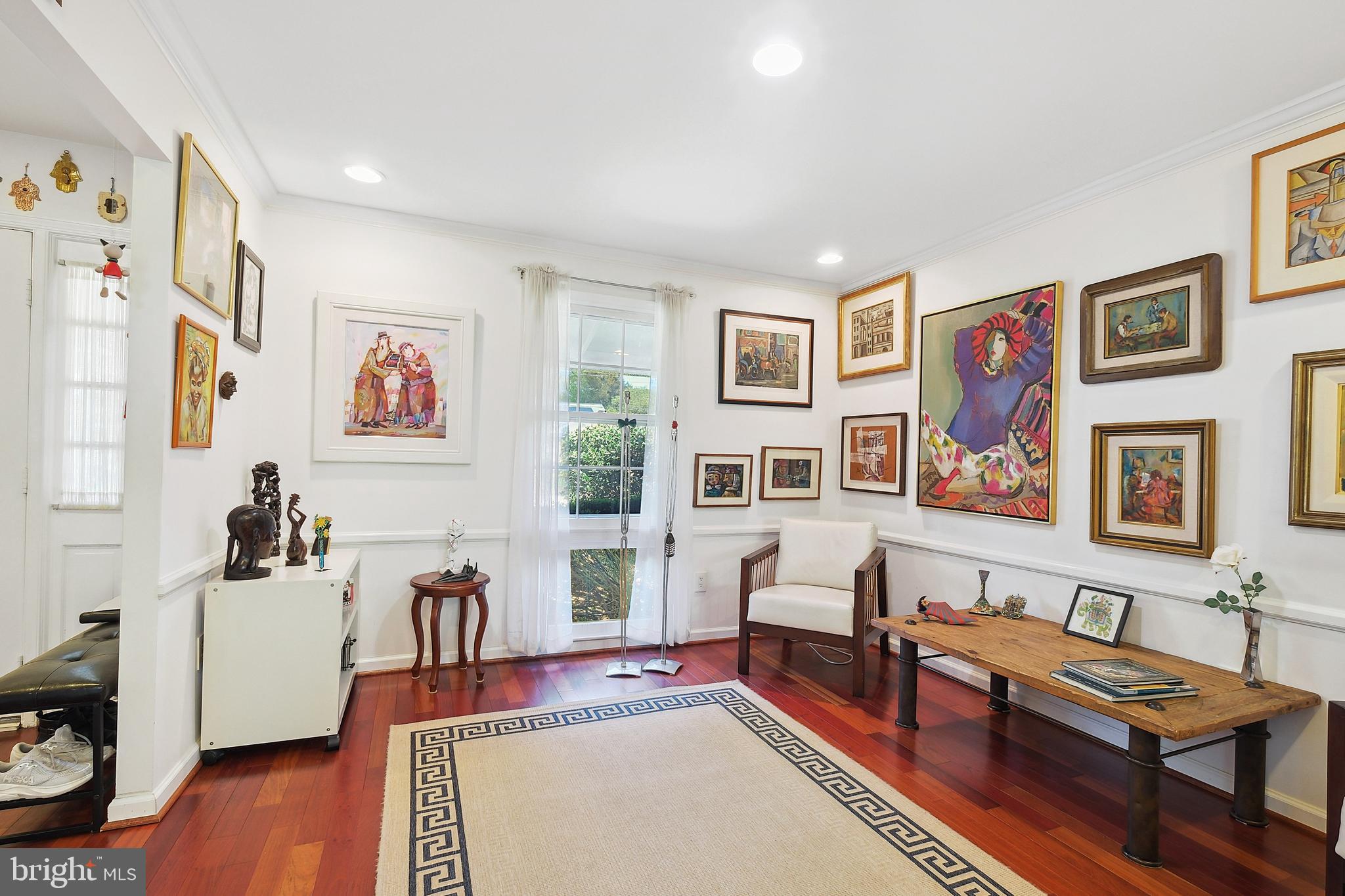 12012 Coldstream Drive Potomac, MD 20854 - Photo 9 of 42 a living room with furniture and wooden floor