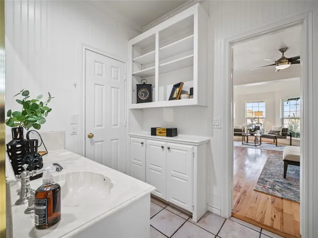 a kitchen with a sink and cabinets