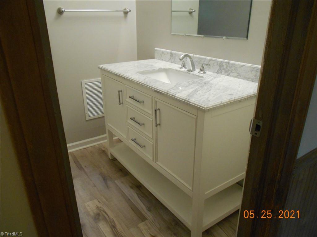737 Old Camp Road Denton, NC 27239 - Photo 18 of 25 Hall bath with beautiful new vanity