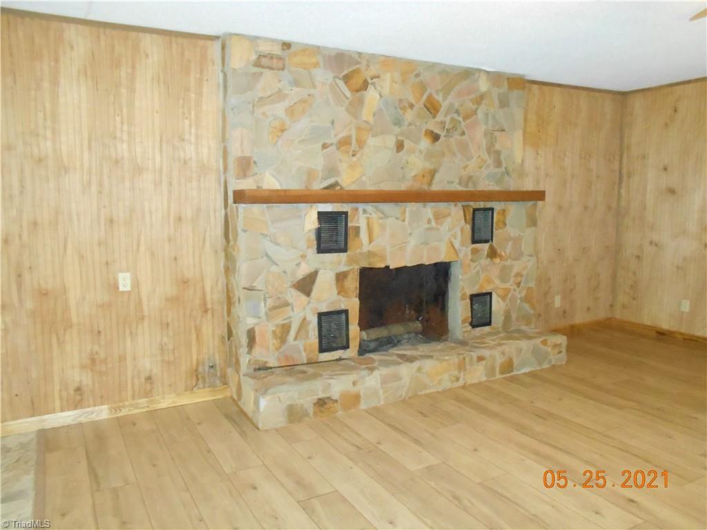 737 Old Camp Road Denton, NC 27239 - Photo 8 of 25 Lovely rock fireplace with heat-o-lator