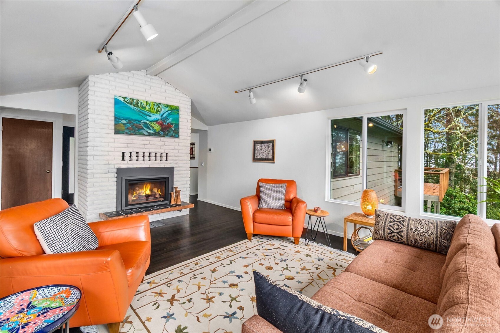6028 Northill Loop Southwest Olympia, WA 98512 - Photo 12 of 38 a living room with furniture and a fireplace