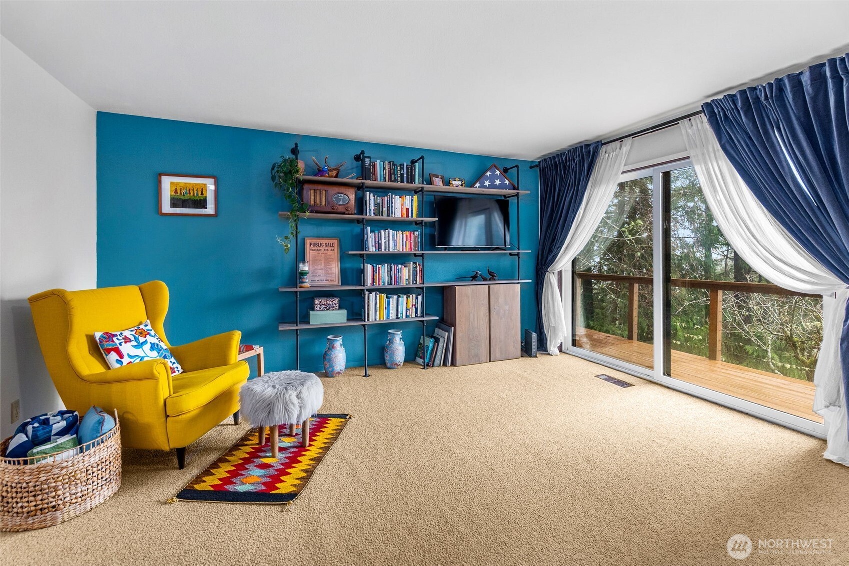 6028 Northill Loop Southwest Olympia, WA 98512 - Photo 15 of 38 a bedroom with furniture and a book shelf