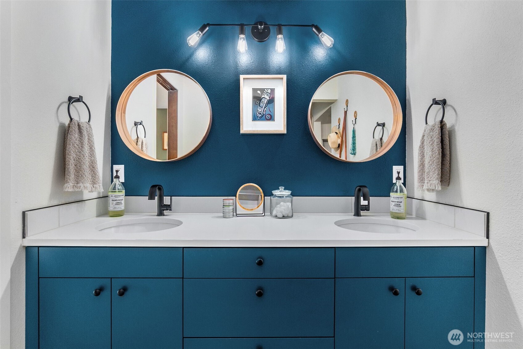 6028 Northill Loop Southwest Olympia, WA 98512 - Photo 17 of 38 a bathroom with a double vanity sink and a mirror