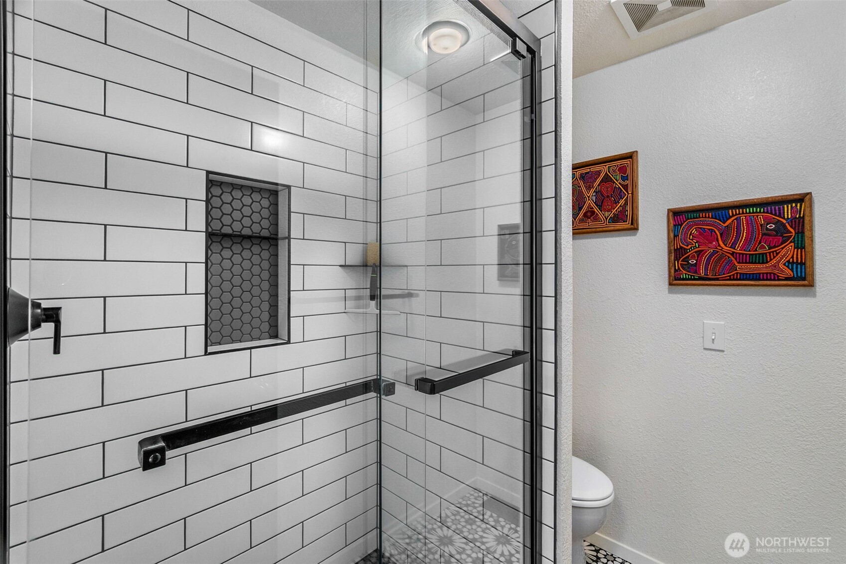 6028 Northill Loop Southwest Olympia, WA 98512 - Photo 18 of 38 a bathroom with a shower and toilet