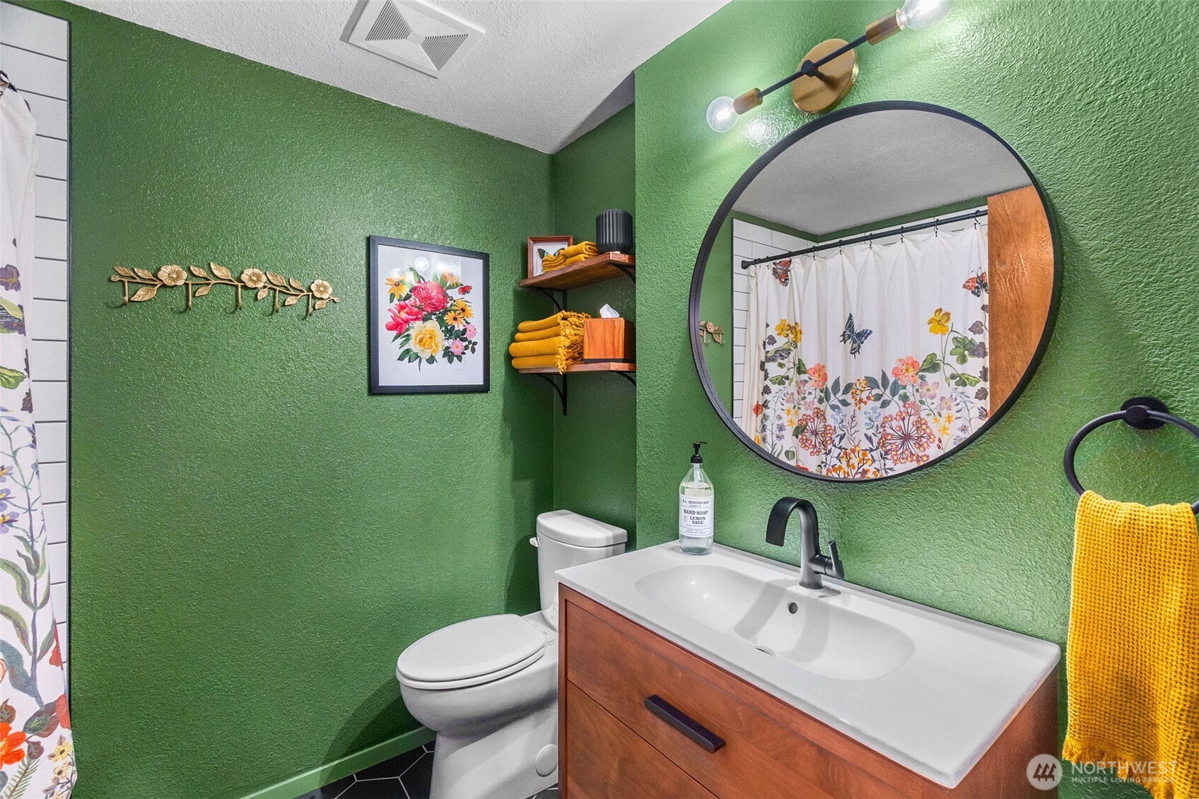 6028 Northill Loop Southwest Olympia, WA 98512 - Photo 20 of 38 a bathroom with a toilet sink and mirror