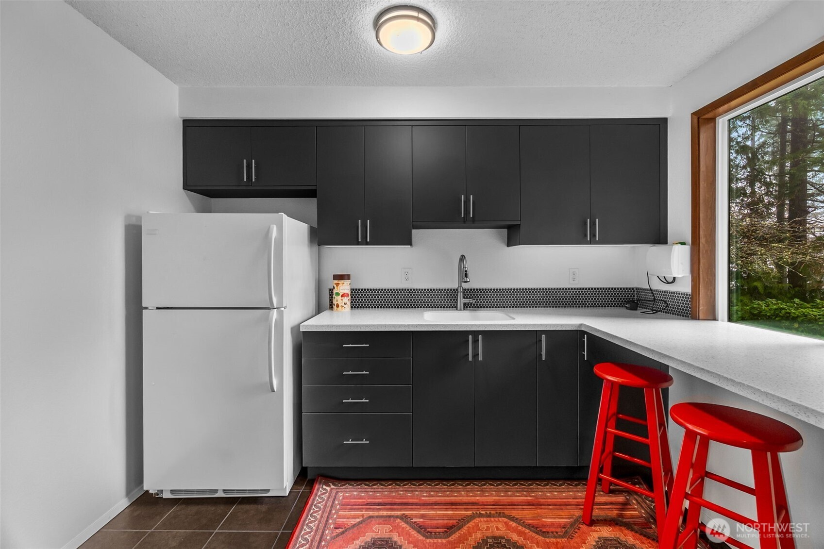 6028 Northill Loop Southwest Olympia, WA 98512 - Photo 21 of 38 a kitchen with a refrigerator and a sink