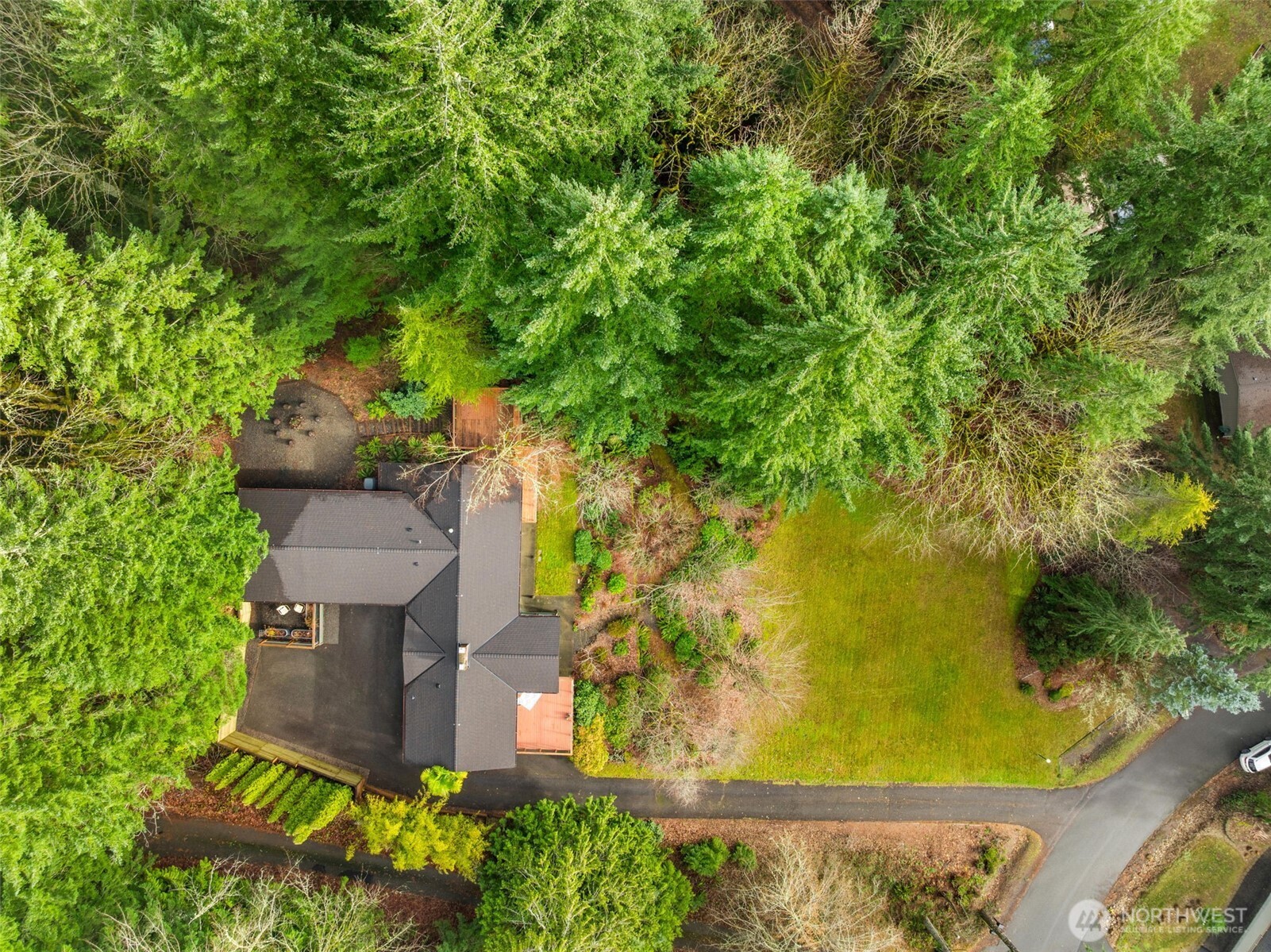 6028 Northill Loop Southwest Olympia, WA 98512 - Photo 36 of 38 an aerial view of a house with a yard basket ball court and outdoor seating