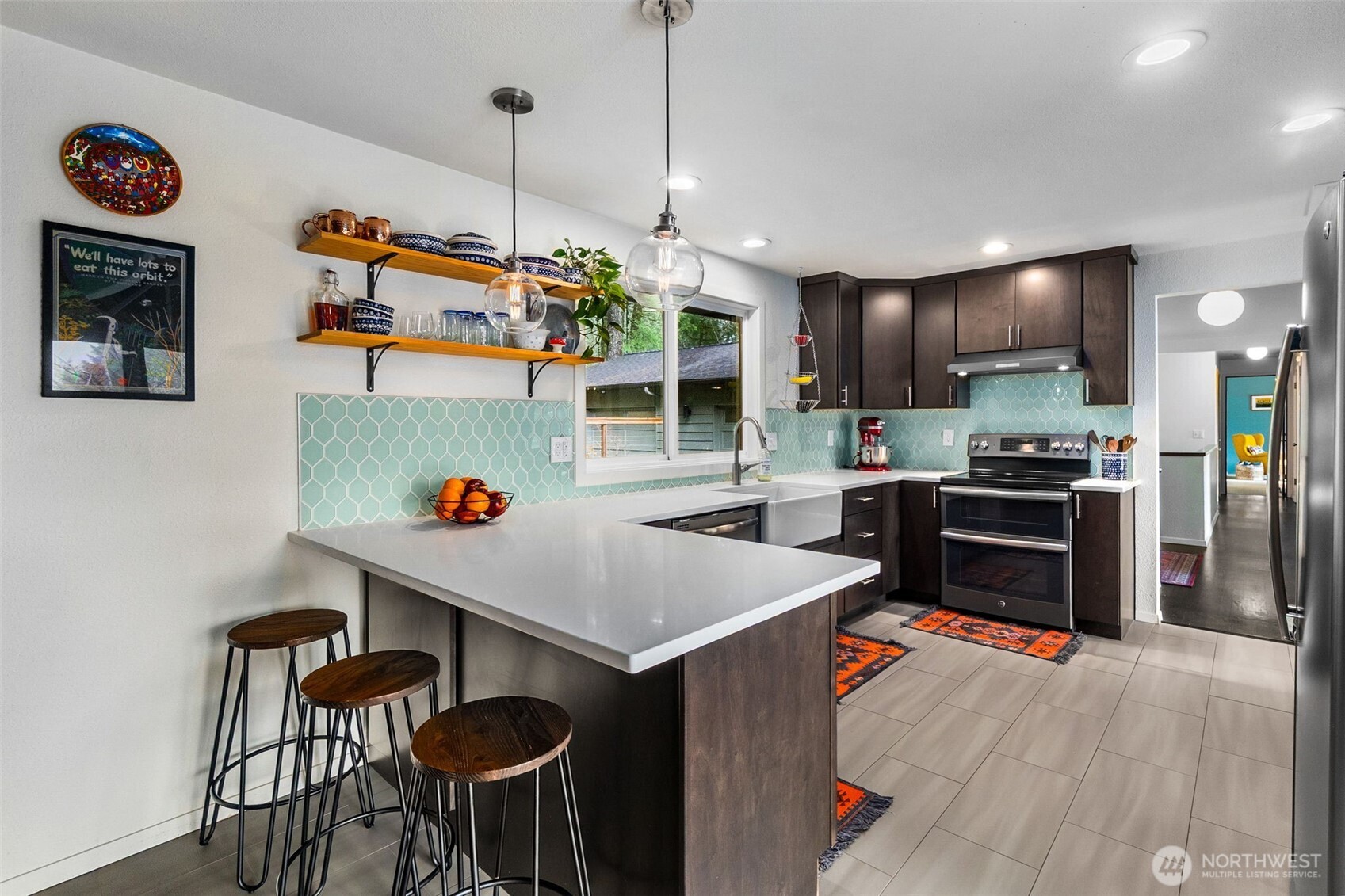6028 Northill Loop Southwest Olympia, WA 98512 - Photo 5 of 38 a living room with furniture and a flat screen tv