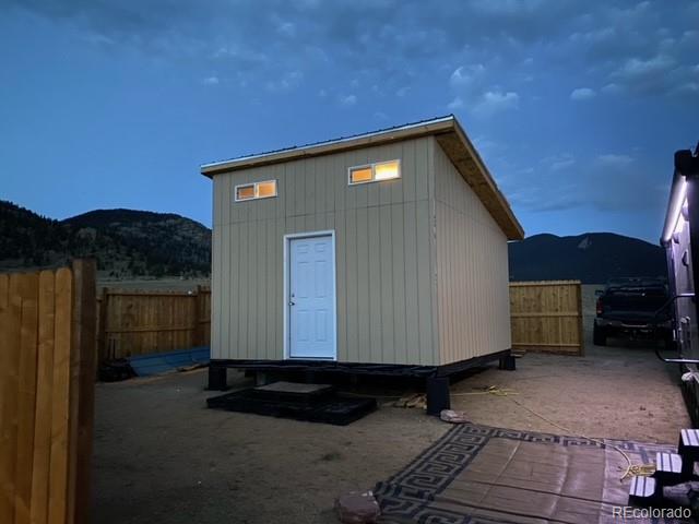 930 Garfield Road Hartsel, CO 80449 - Photo 2 of 12 a view of backyard with cabin