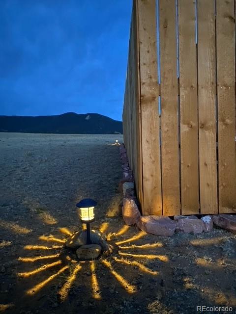 930 Garfield Road Hartsel, CO 80449 - Photo 9 of 12 a view of a balcony with a fireplace