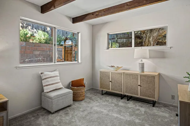 a room with furniture and window