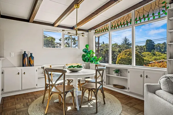 a view of an outdoor dining space with furniture
