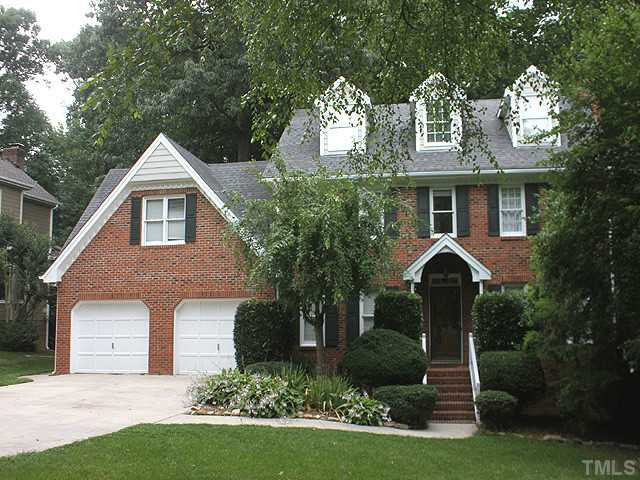7908 Farnham Court Raleigh, NC 27615 - Photo 1 of 25 Wonderful 2.5 Story Classic Traditional Brick Front Home. Awesome Curb Appeal With Established Landscaping. Exterior Front