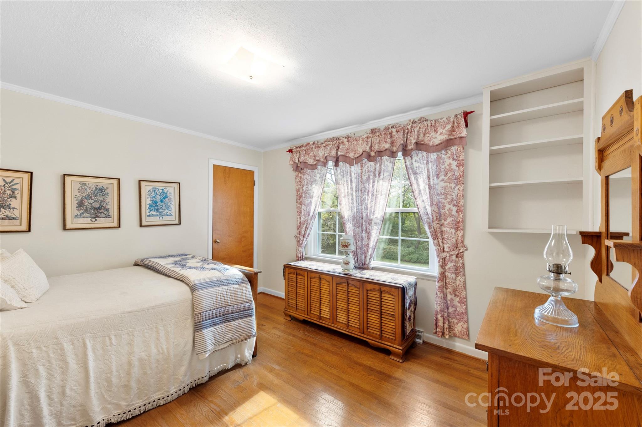 458 Roy Eaker Road Cherryville, NC 28021 - Photo 17 of 33 a bedroom with a bed and a large window