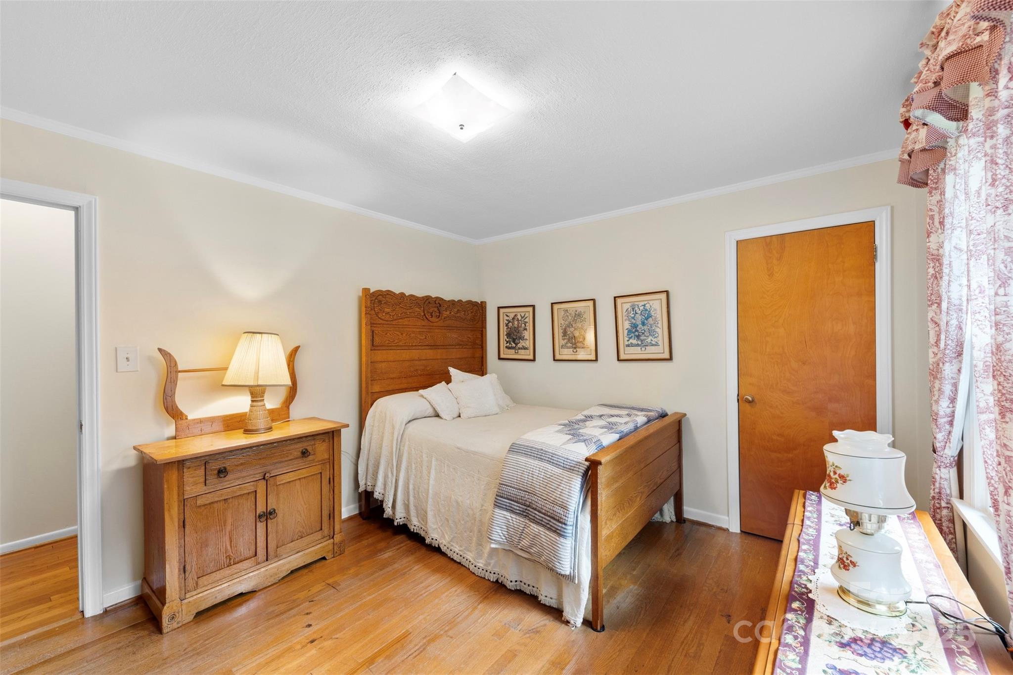 458 Roy Eaker Road Cherryville, NC 28021 - Photo 18 of 33 a bedroom with a bed and a night stand