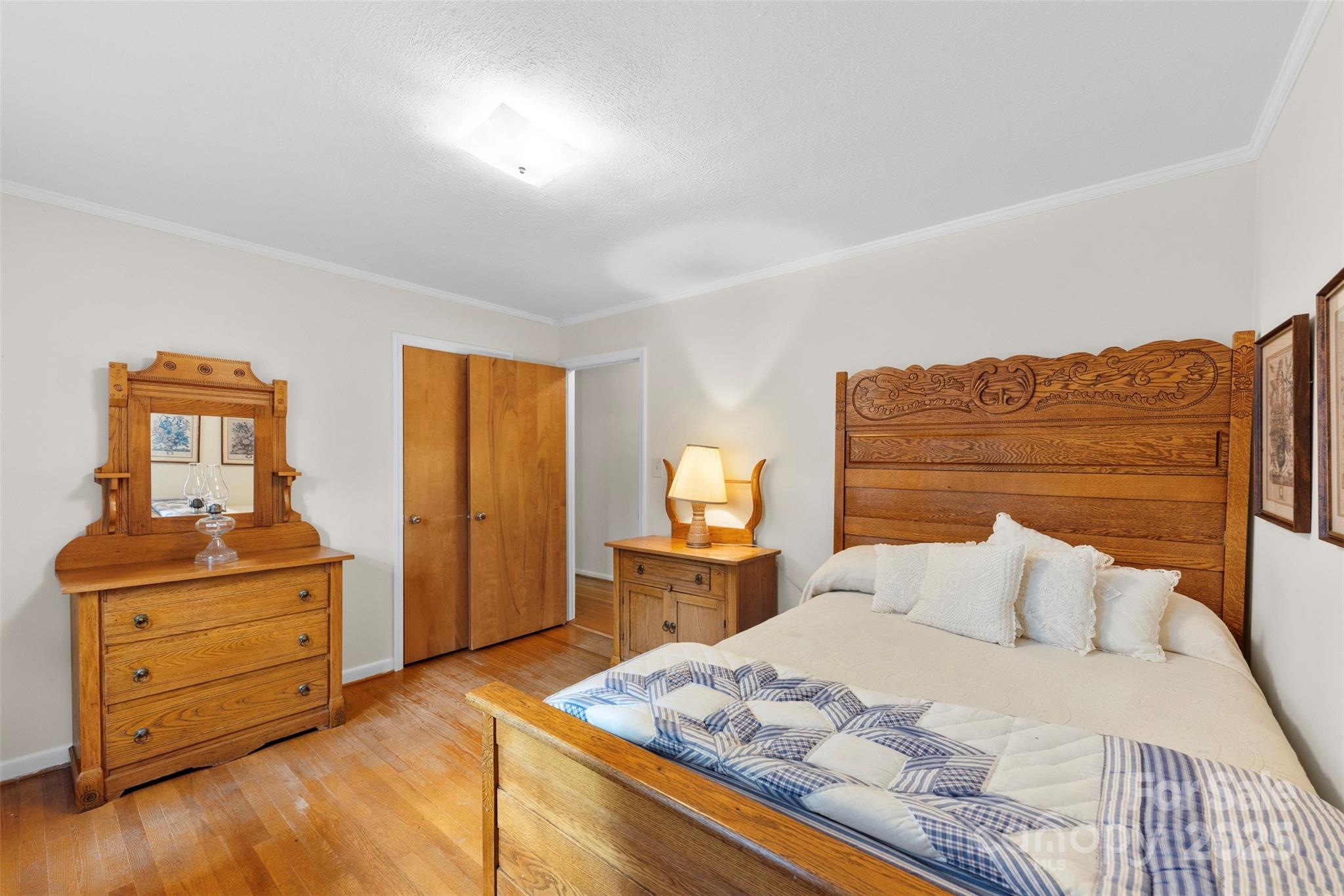 458 Roy Eaker Road Cherryville, NC 28021 - Photo 19 of 33 a bedroom with a bed and a dresser