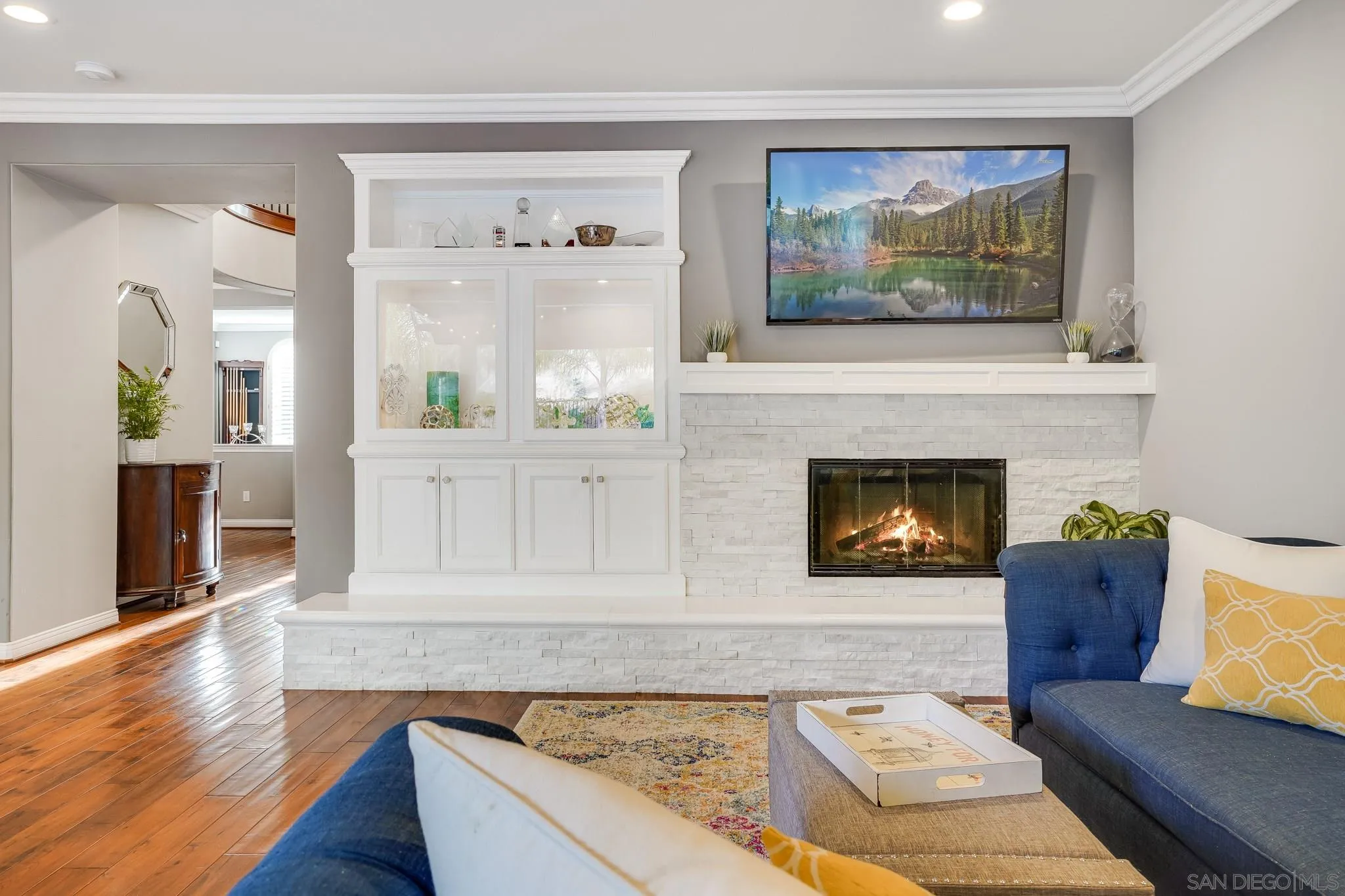 16375 Cayenne Ridge Road San Diego, CA 92127 - Photo 11 of 35 a living room with furniture and a fireplace