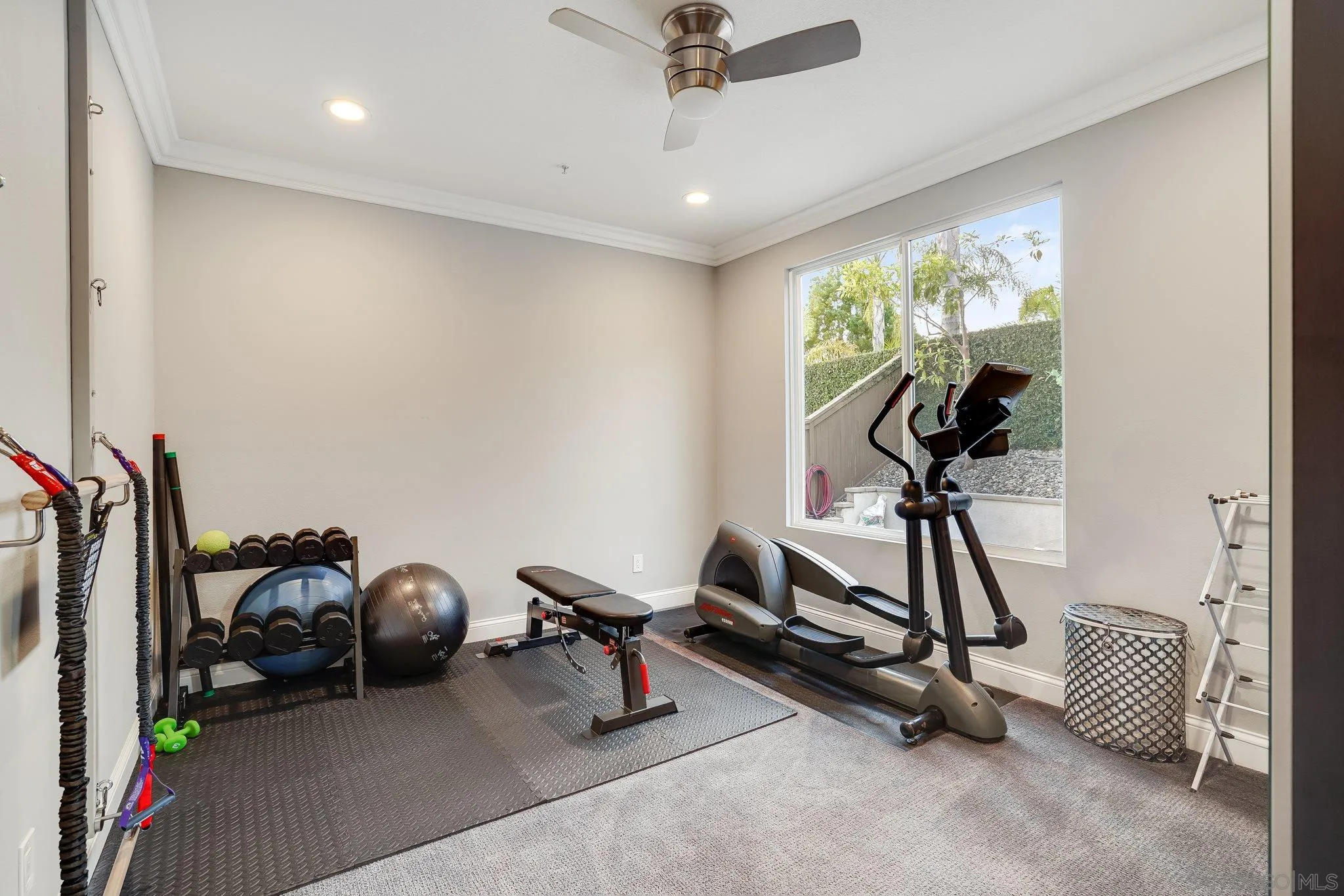 16375 Cayenne Ridge Road San Diego, CA 92127 - Photo 18 of 35 a view of a room with gym equipment