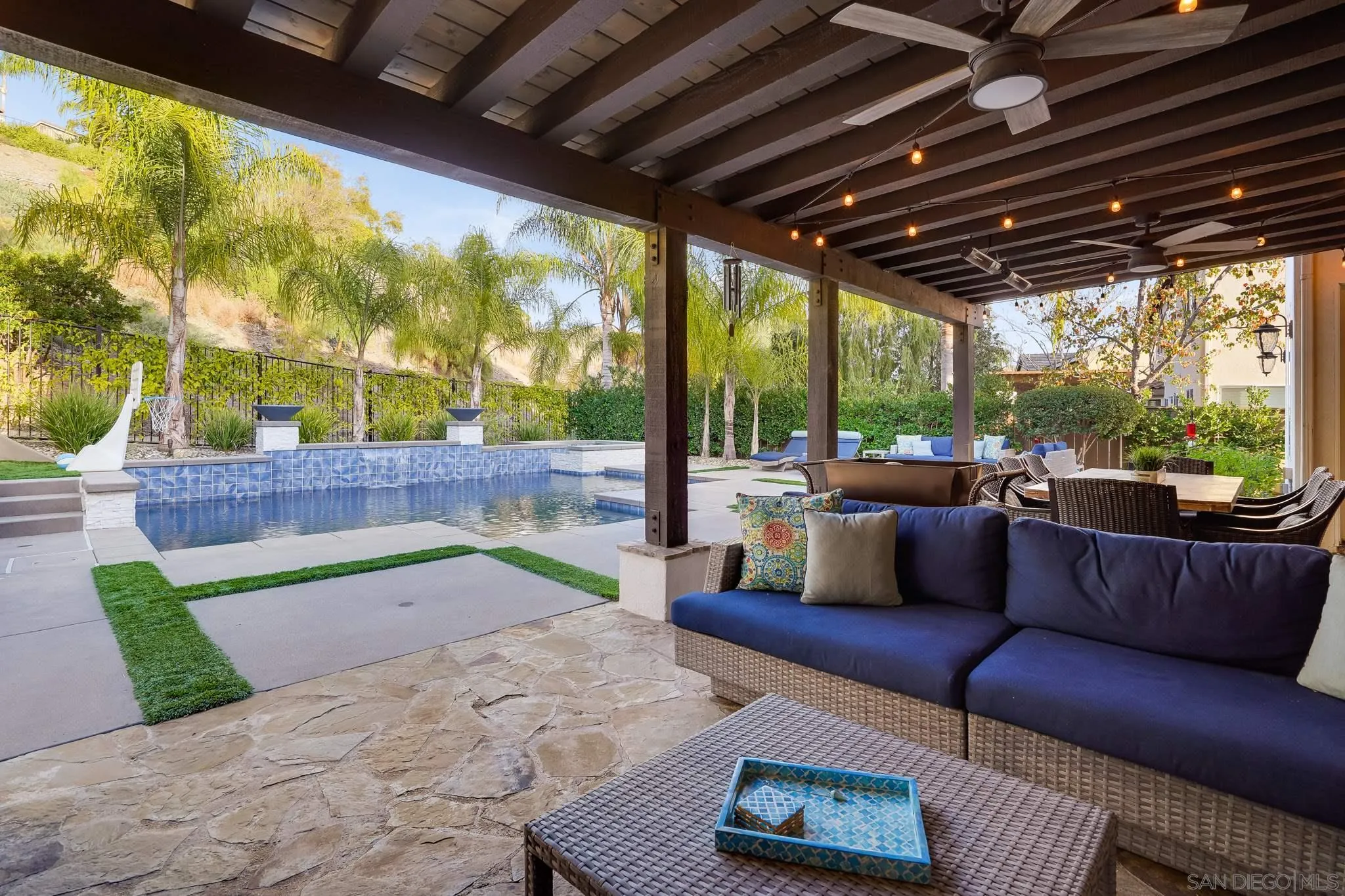 16375 Cayenne Ridge Road San Diego, CA 92127 - Photo 31 of 35 a outdoor living space with patio furniture and a garden